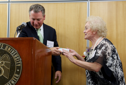 Dr. David Lefer, Director of the LSU Cardiovascular Center of Excellence, thanks Dr. Mary Lou Applewhite for her generosity.